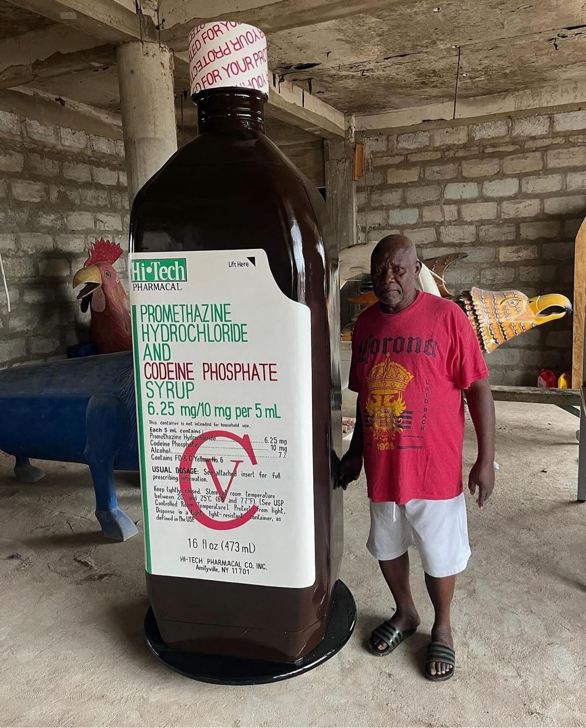 a human-sized coffin shaped like a bottle of medicine